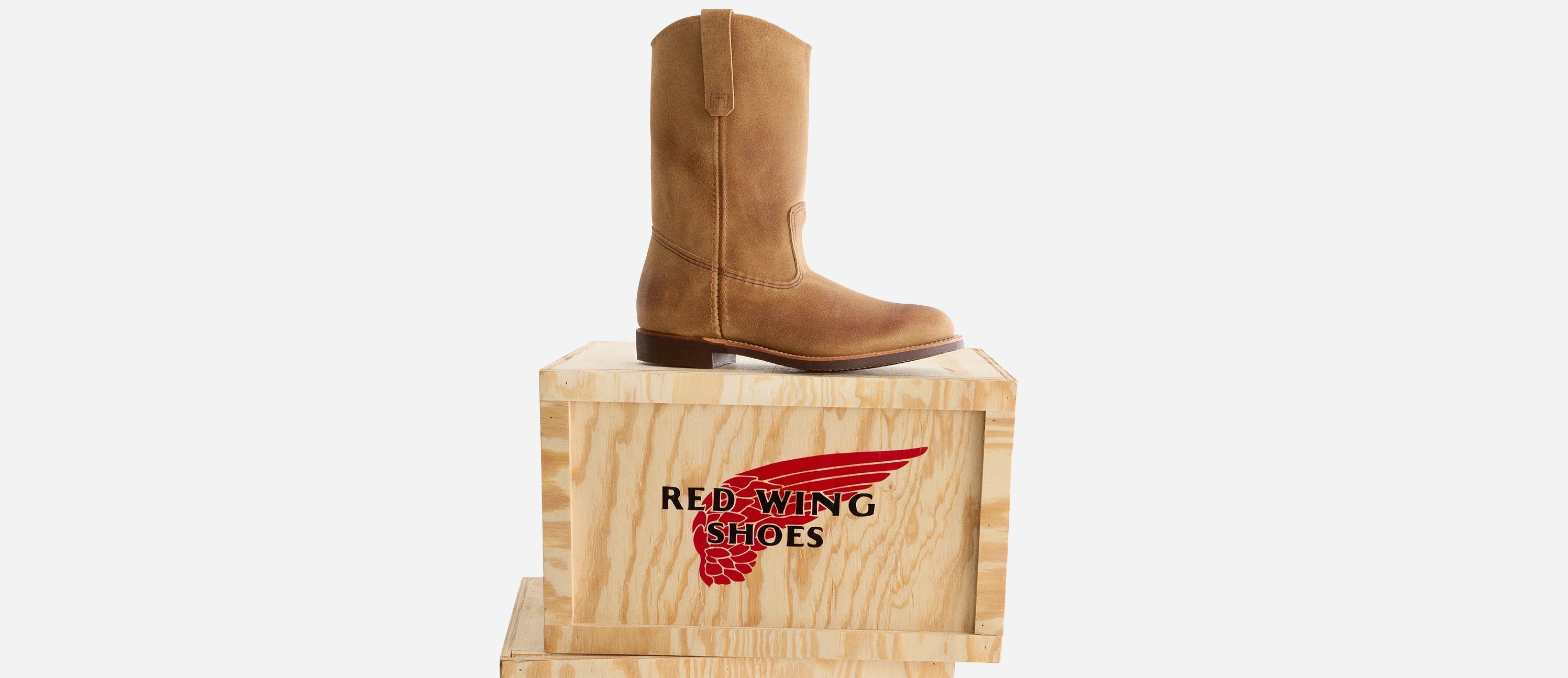 Red Wing Peco boot stacked on Red Wing boxes