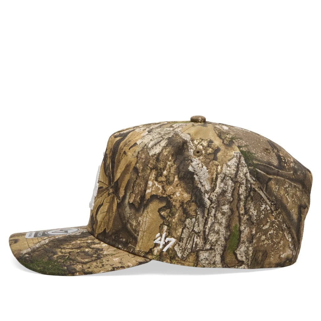 Camouflage baseball cap with '47' logo on a white background
