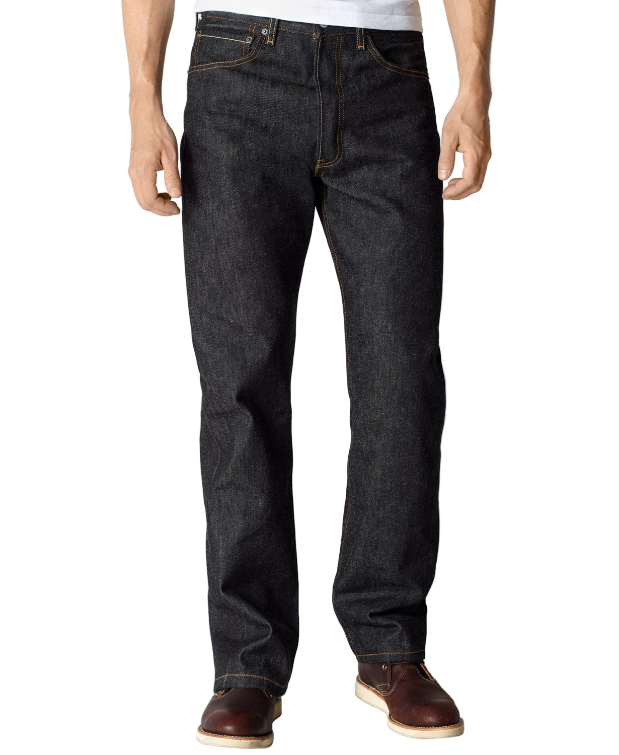 A person standing straight facing to the side, wearing black rigid 501 Original Fit Jeans and brown shoes.