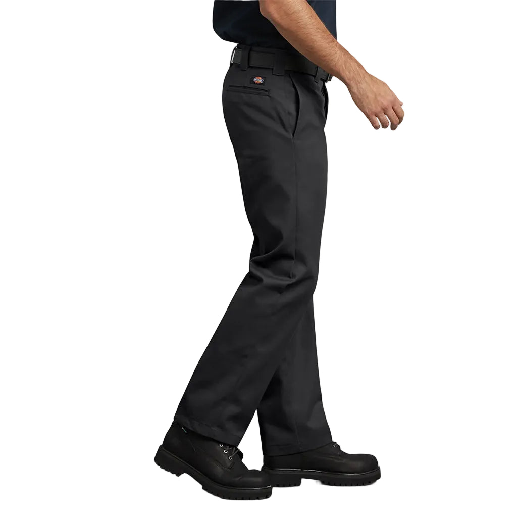 Black pants worn by a person on a white background