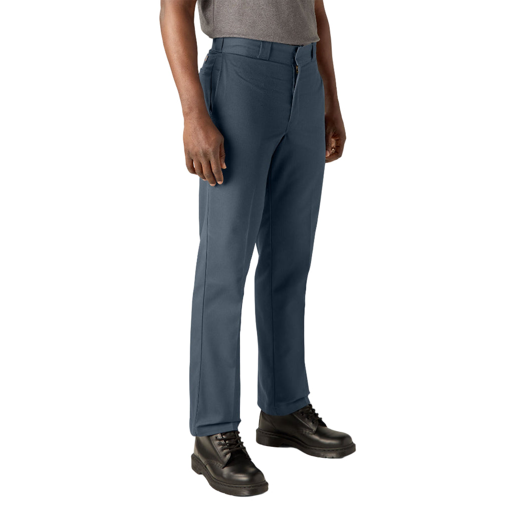 Person wearing blue pants on a white background