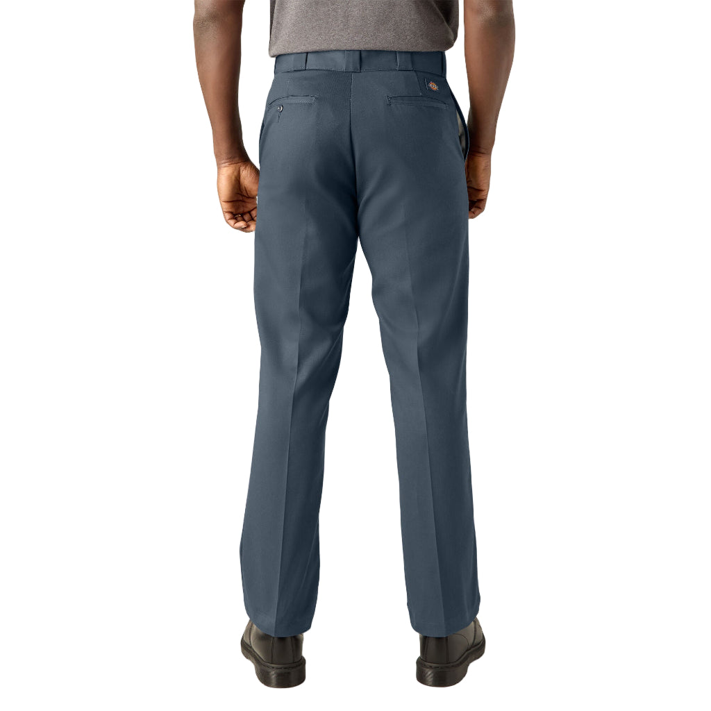 Person wearing blue pants on a white background