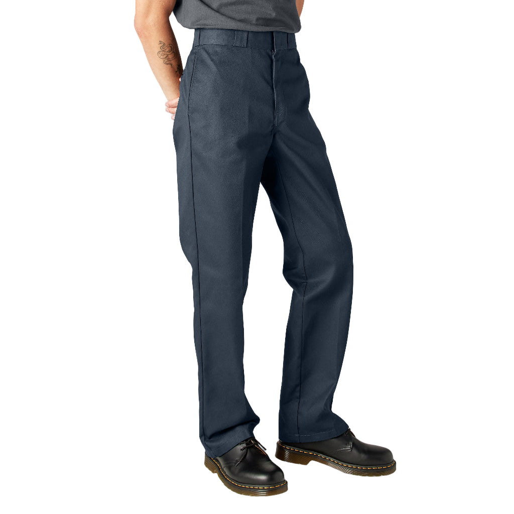 Person wearing dark navy pants on a white background