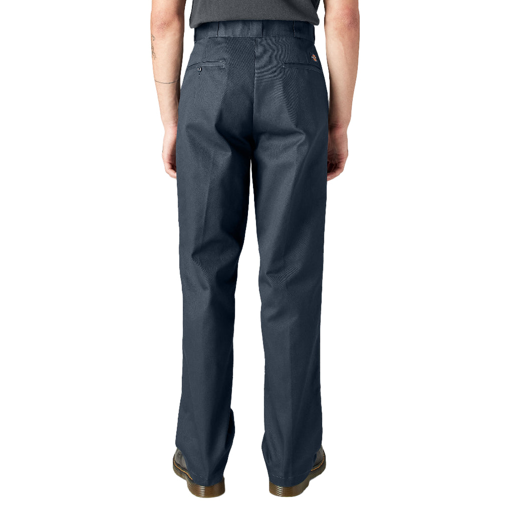 Person wearing dark navy pants on a white background
