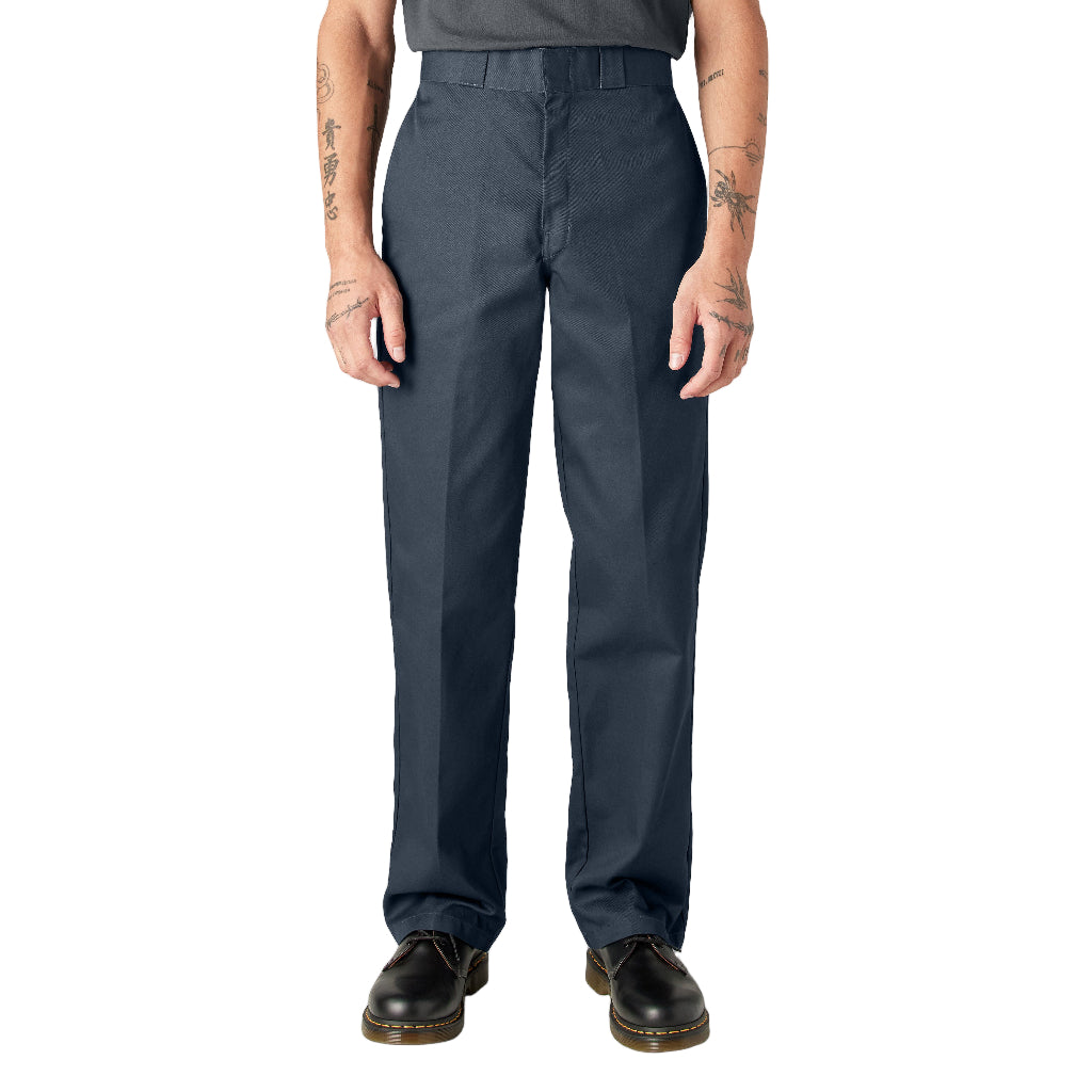 Person wearing dark navy pants on a white background