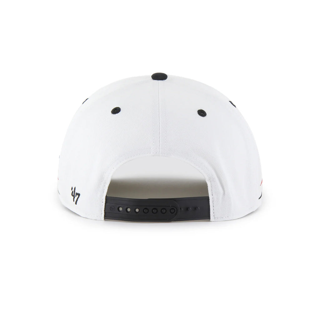 White cap with black accents on a white background