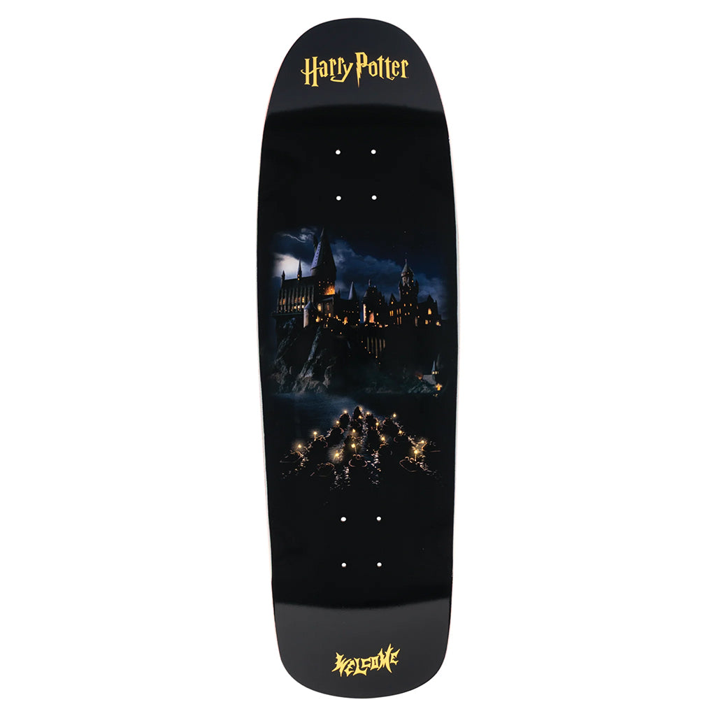 Harry Potter-themed skateboard deck with Hogwarts castle design on a black background