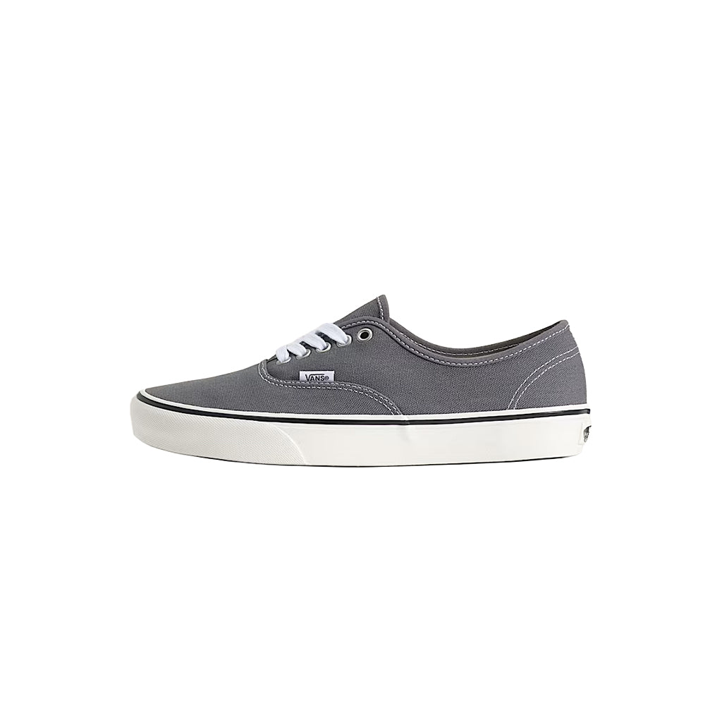 Gray sneaker with white sole on a white background