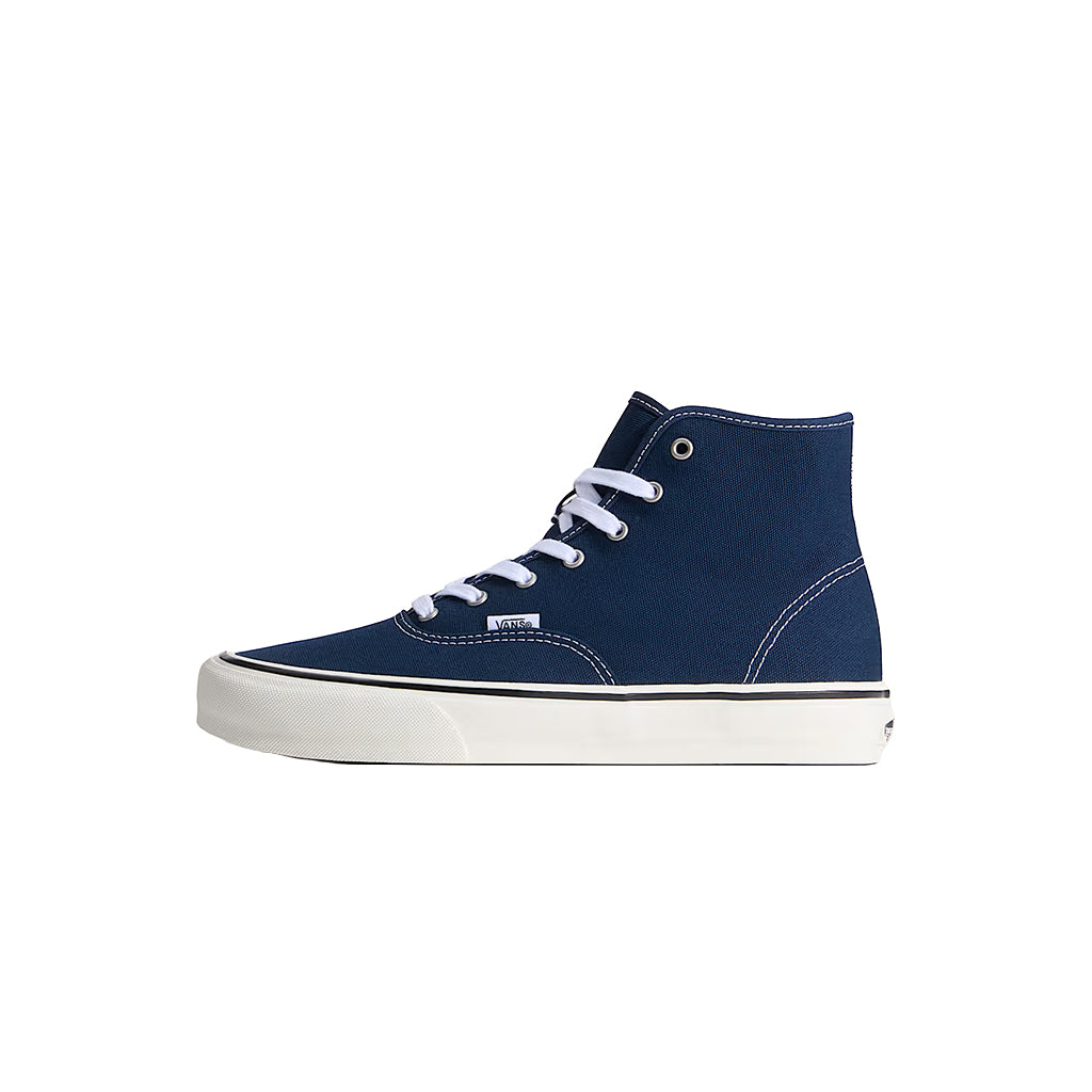 Pair of navy high-top sneakers with white laces on a white background