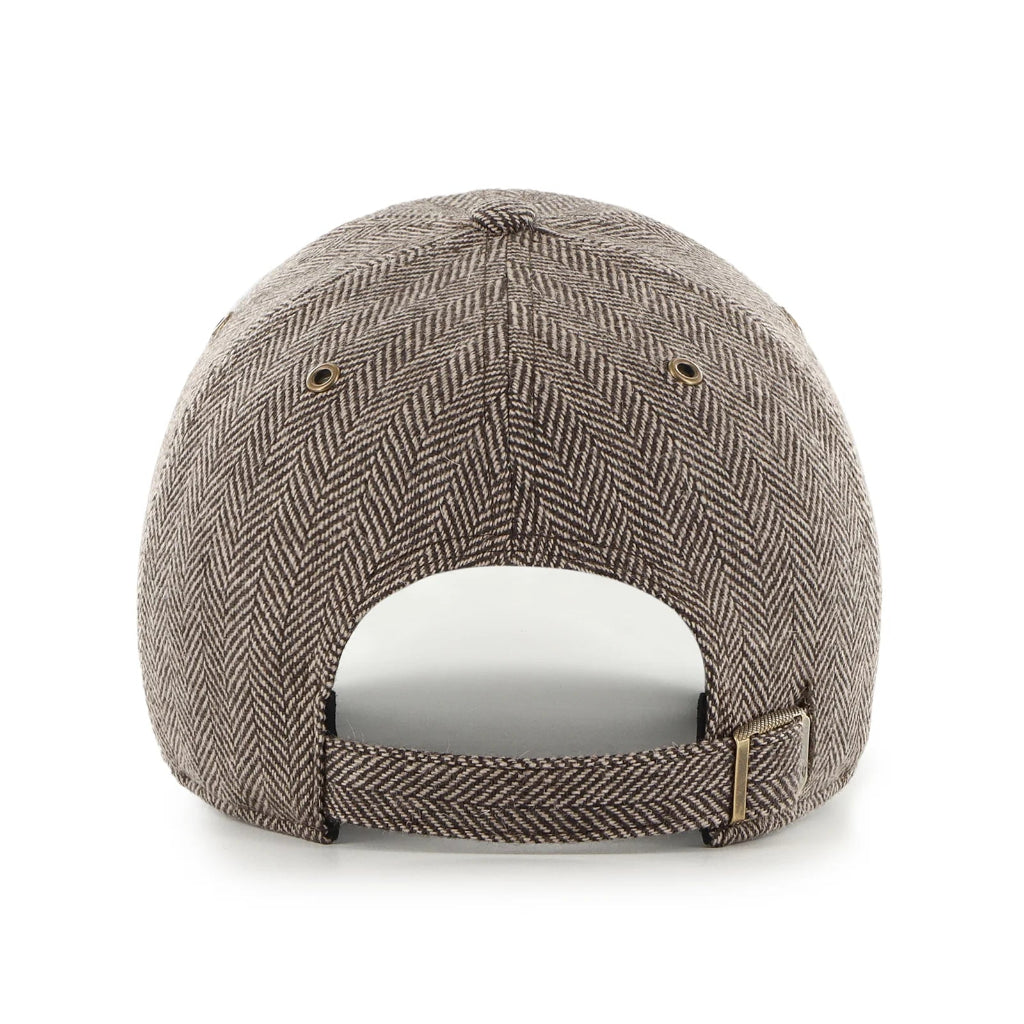 Brown patterned cap on a white background