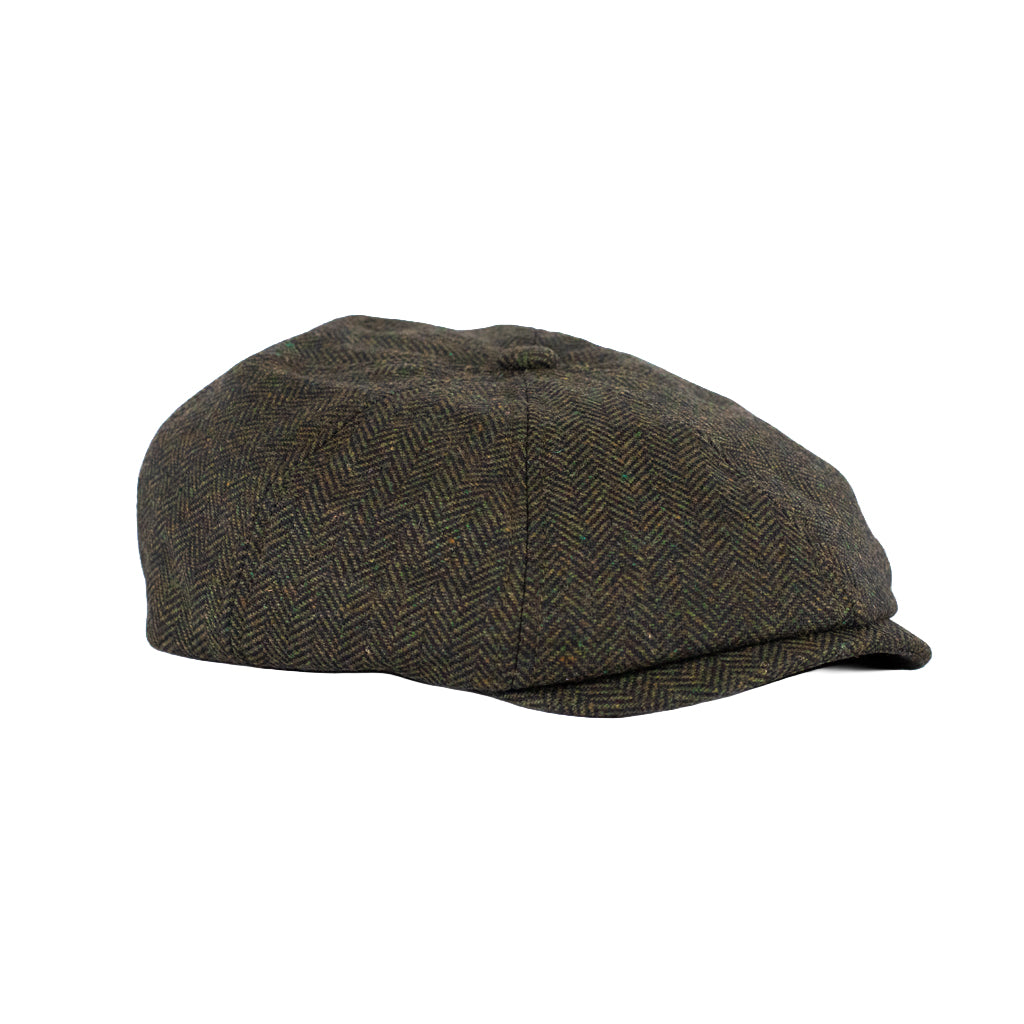 Herringbone patterned cap on a white background