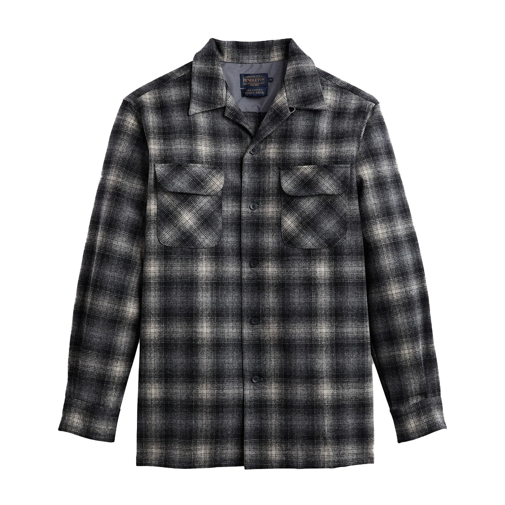 Plaid shirt with two front pockets on a white background
