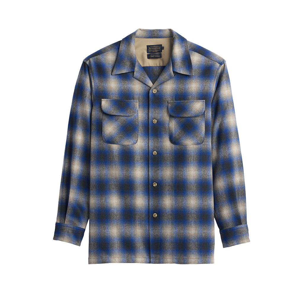 Blue and gray plaid shirt on a white background