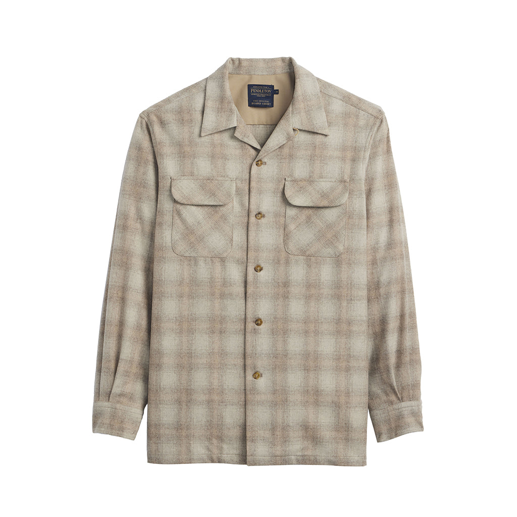 Plaid shirt with button details on a white background