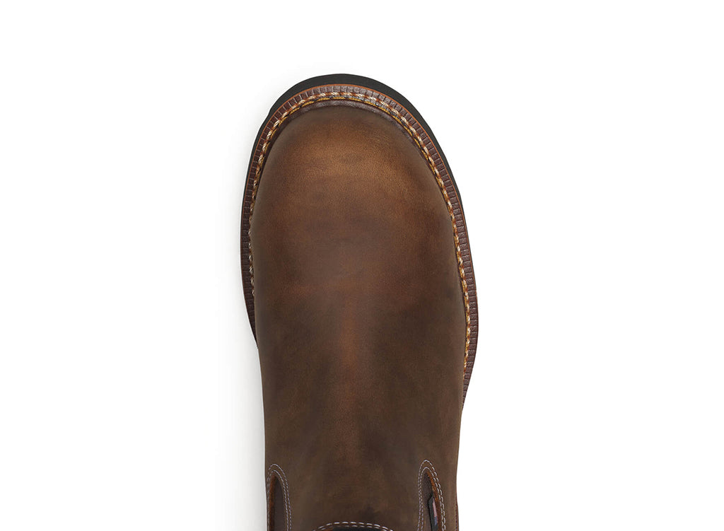 Brown leather boot on a white background