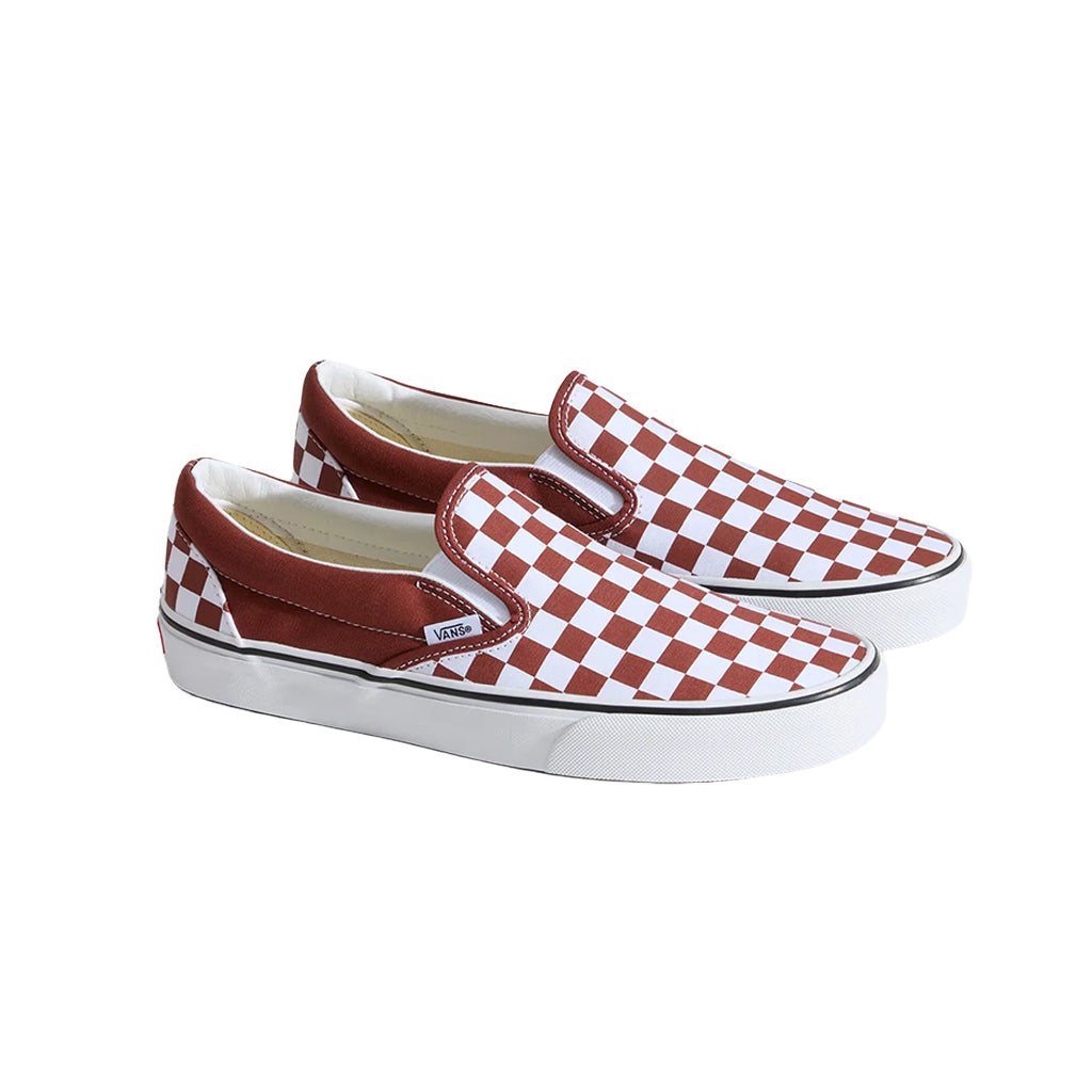 Red and white checkered slip-on shoes on a white background