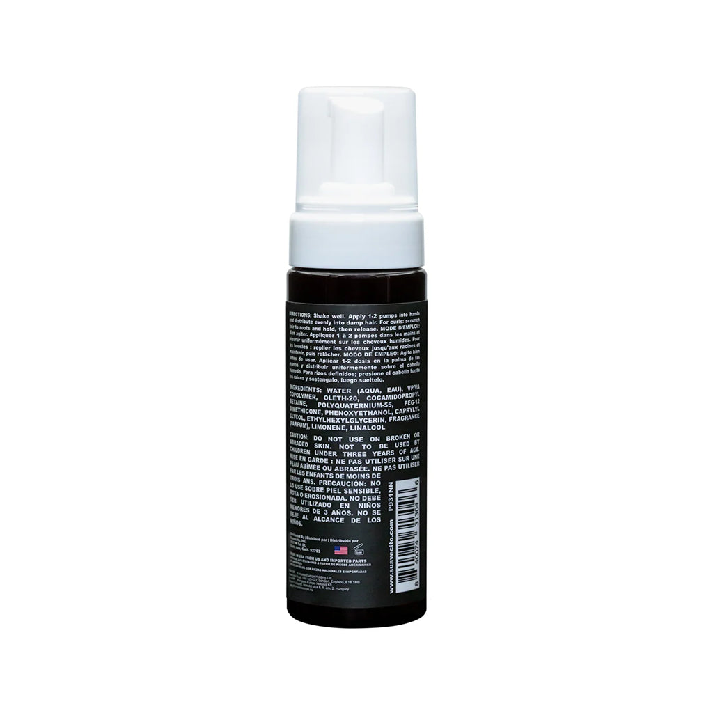 Back of Curl Mousse bottle on a white background