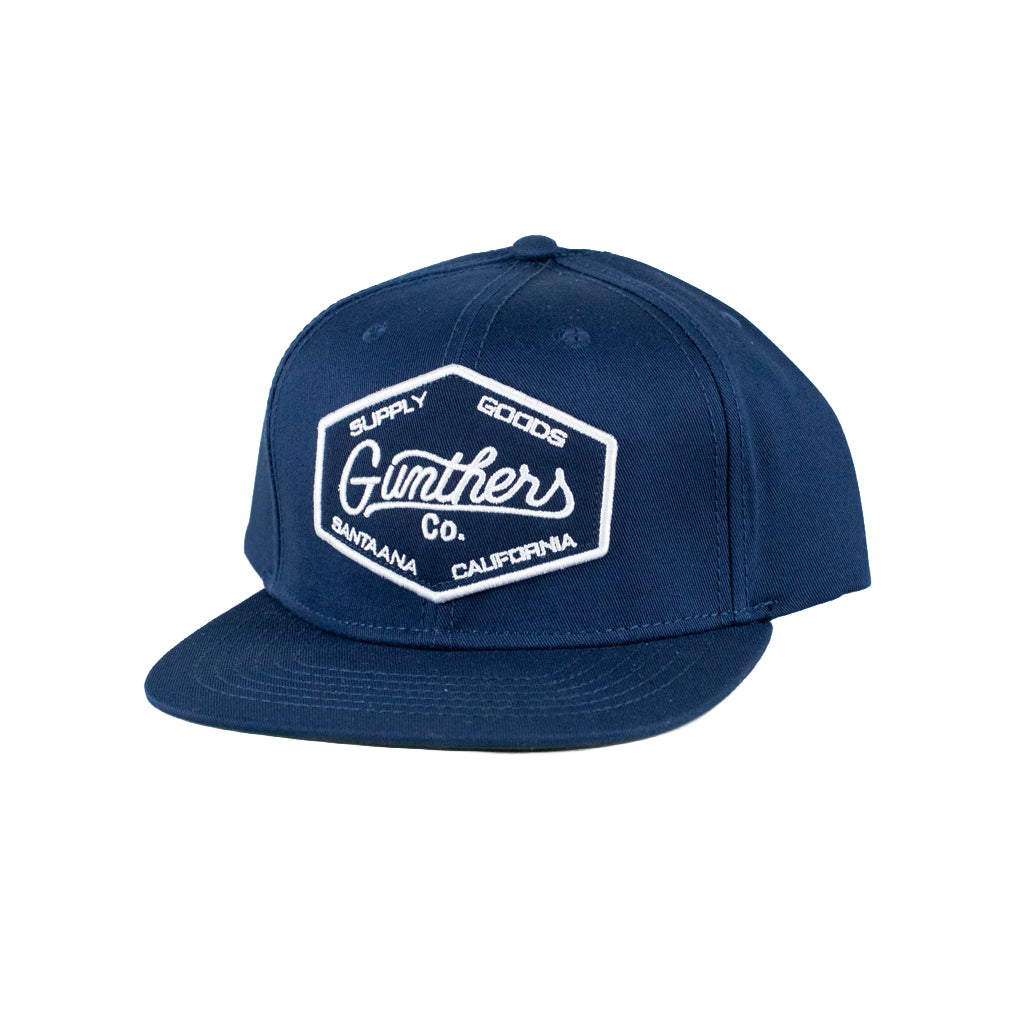 Navy blue cap with white logo on a white background