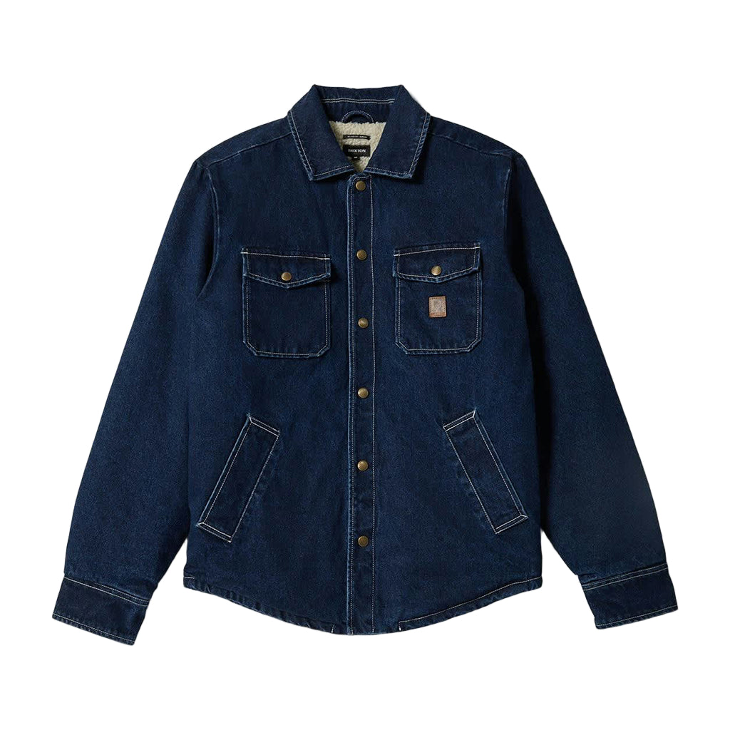 Blue denim jacket on a white background