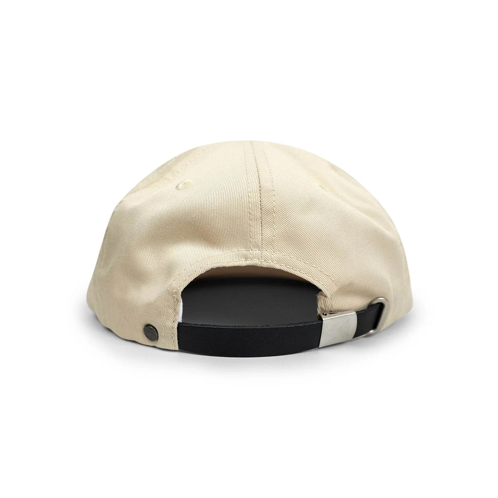 Beige cap with a black and white strap on a white background