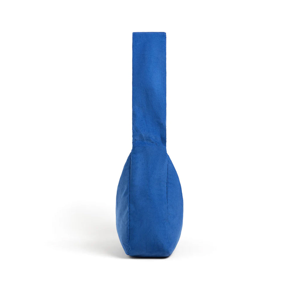 Blue fabric-covered object on a white background