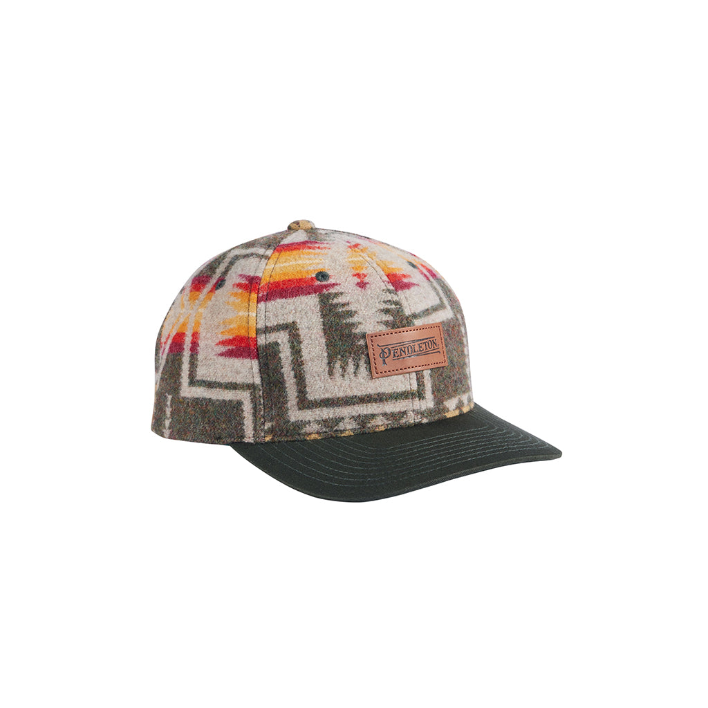 Cap with patterned front and leather patch on a white background