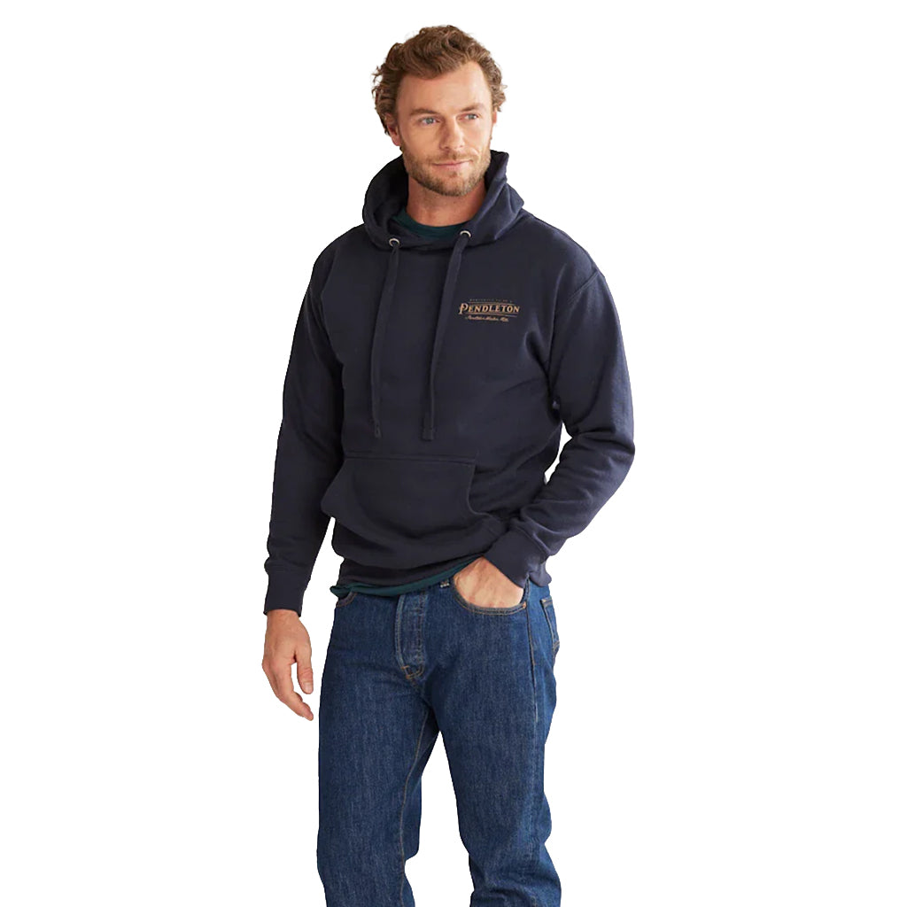 Man wearing a navy hoodie with a logo on a white background