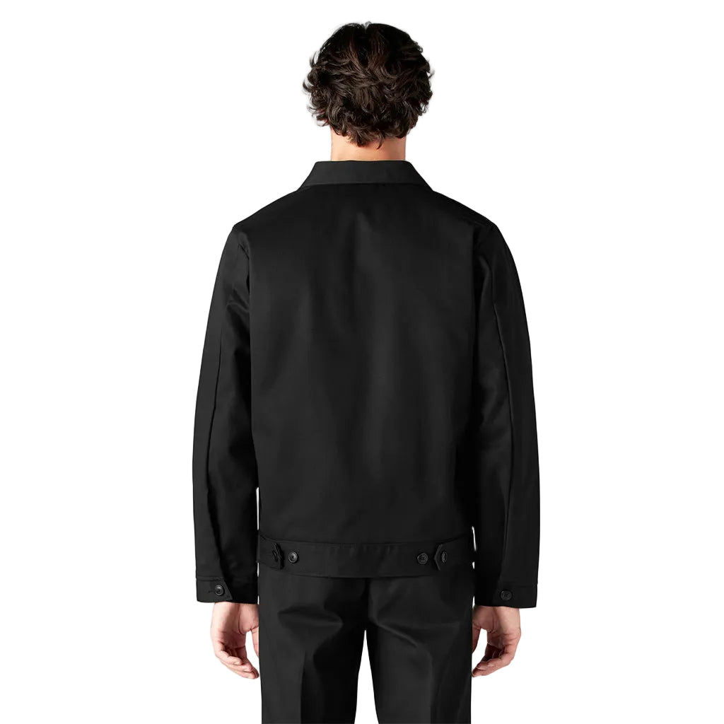Person wearing a black jacket on a white background