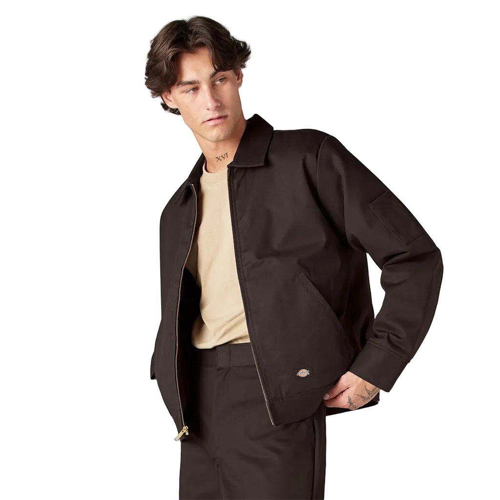 Man wearing a brown jacket on a white background