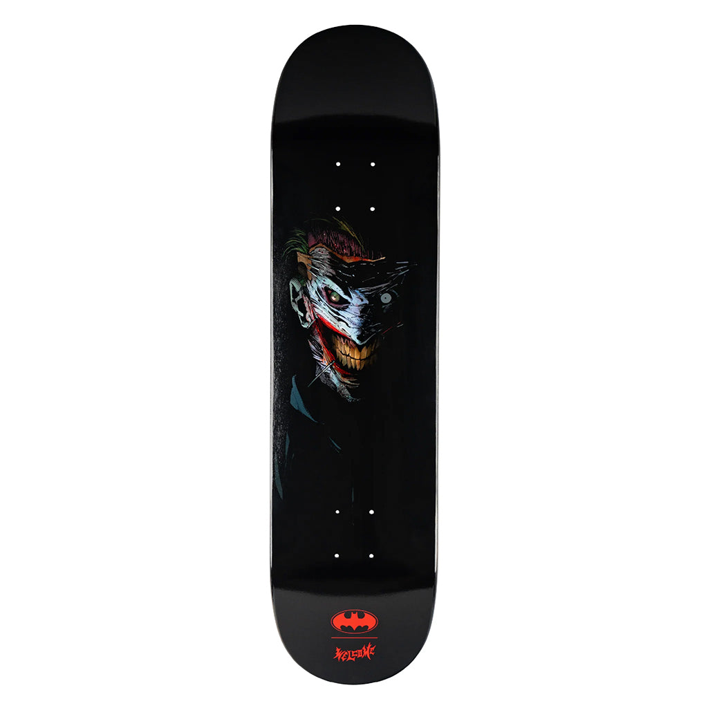 Joker character on a black skateboard on a white background