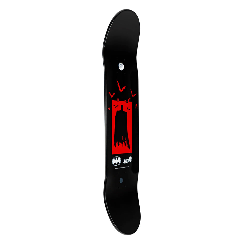 Black skateboard deck with red graphic and white text on a white background