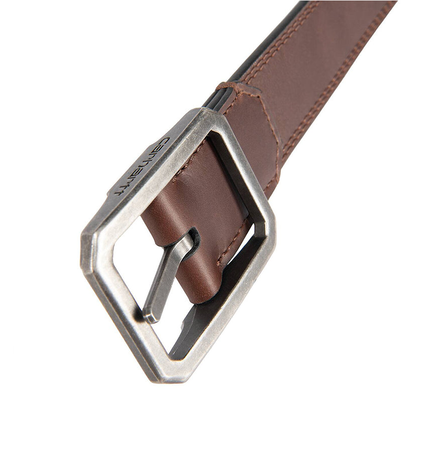 Brown leather belt with a silver buckle on a white background