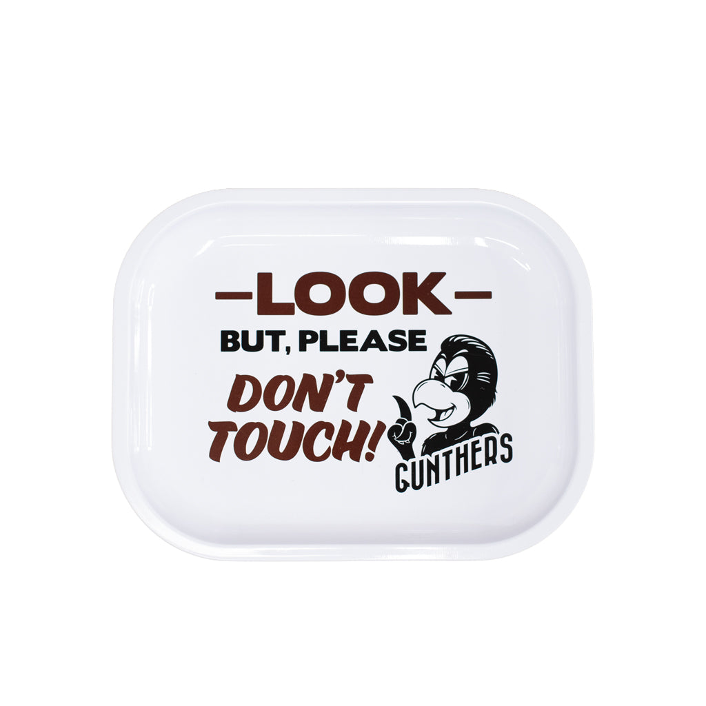 Small white tray with text and a logo on a white background