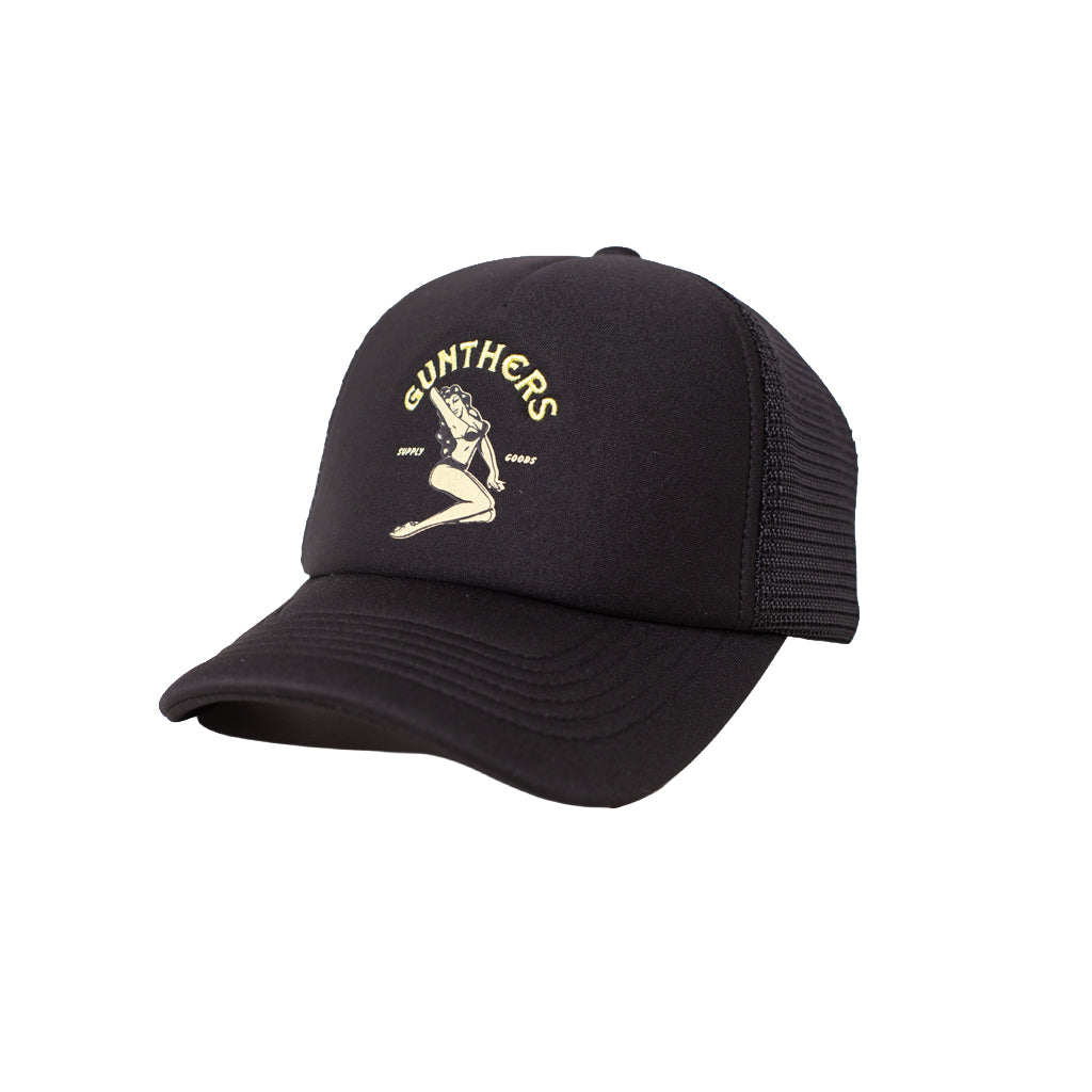 Black cap with embroidered design on a white background