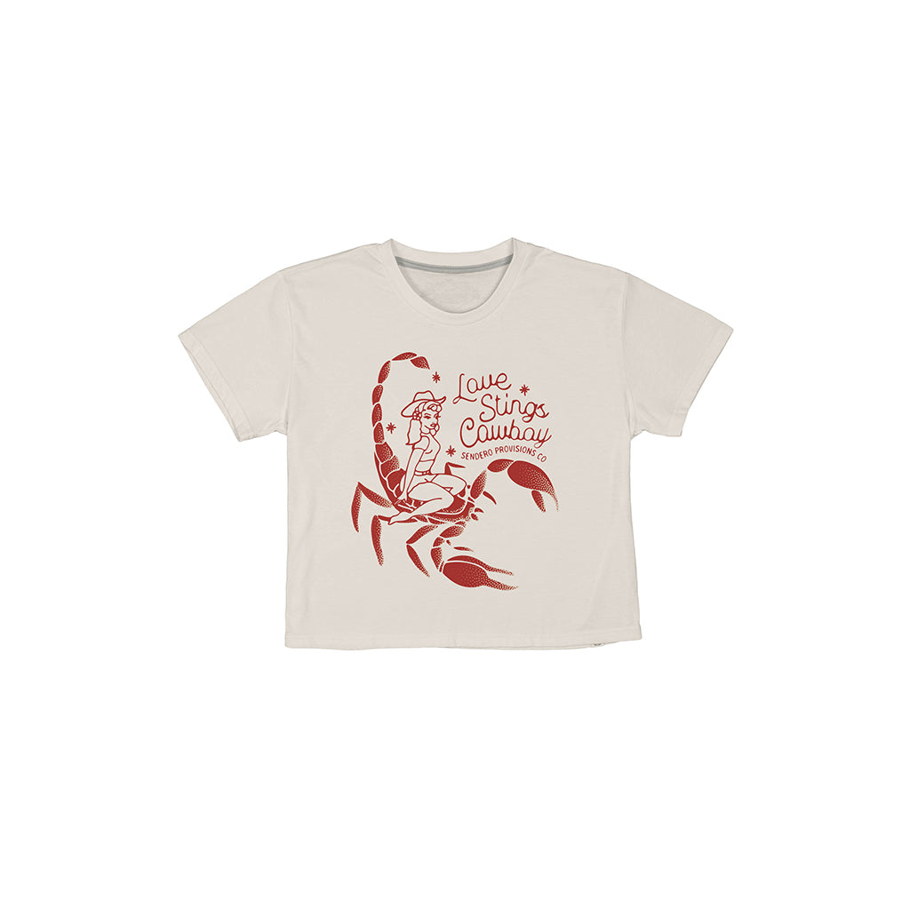 Beige t-shirt with red scorpion graphic and text on a white background