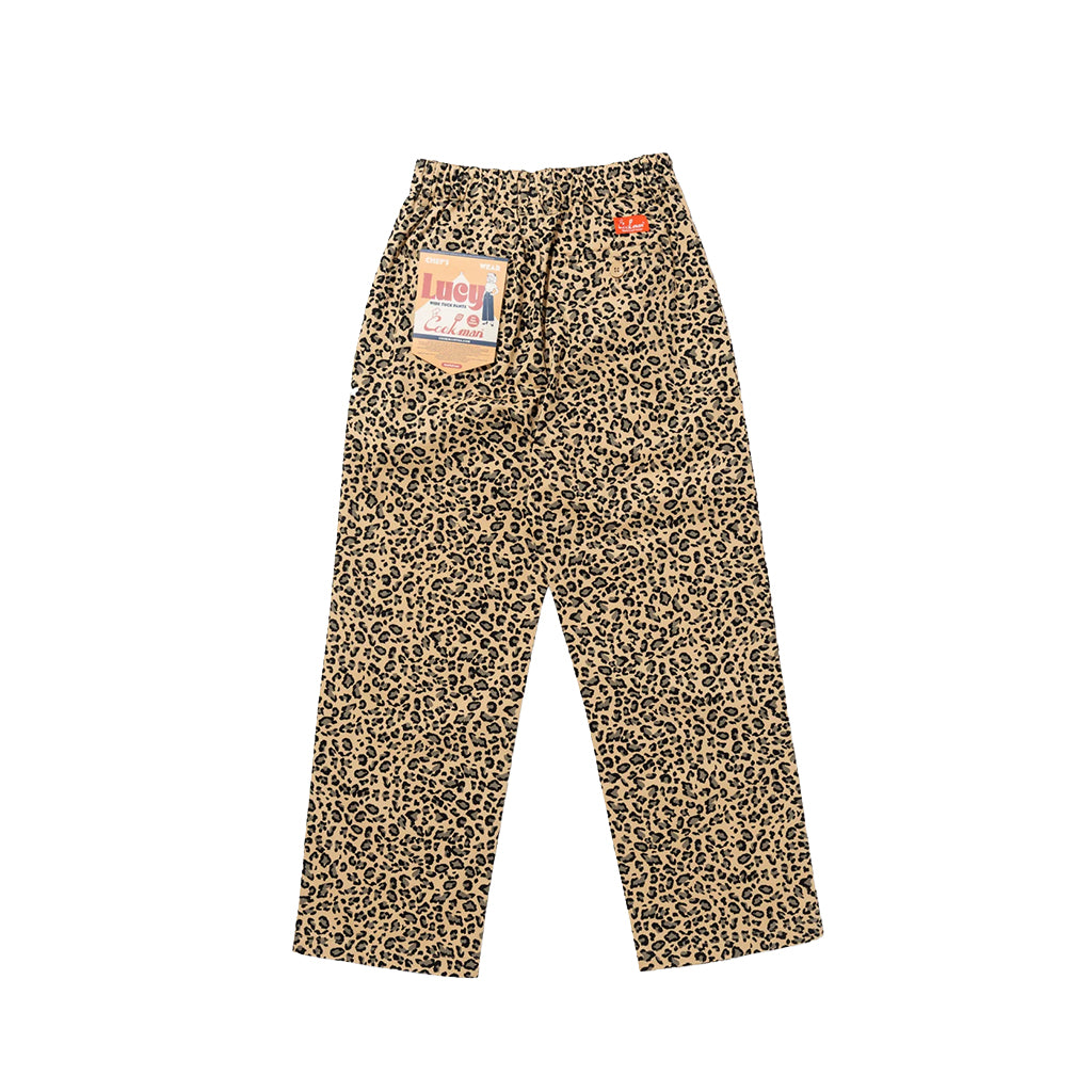 Leopard print pants with a brand tag on a white background