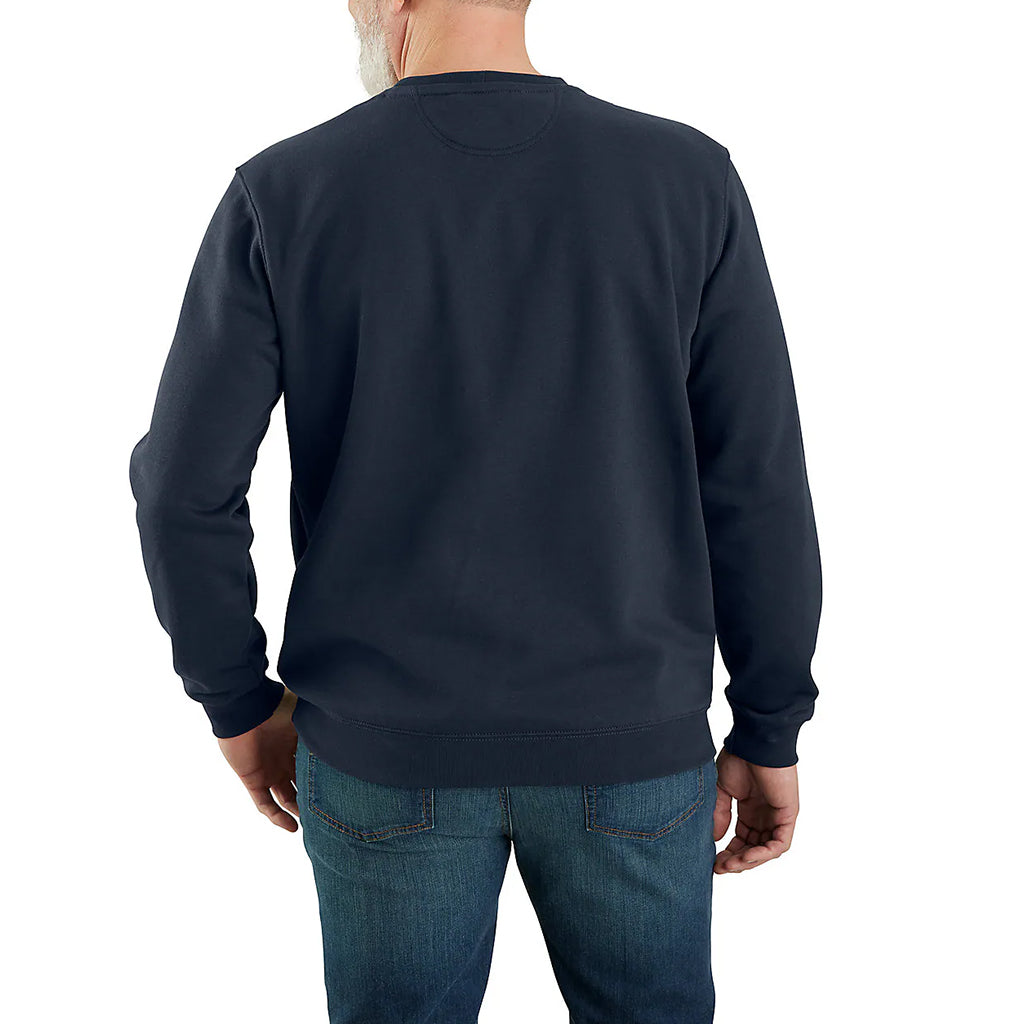 Person wearing a navy blue sweatshirt and jeans on a white background