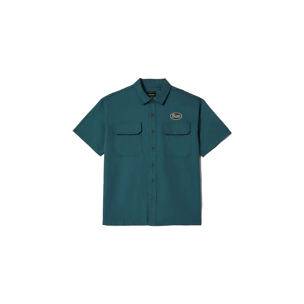 Teal short-sleeve shirt with a logo on a white background