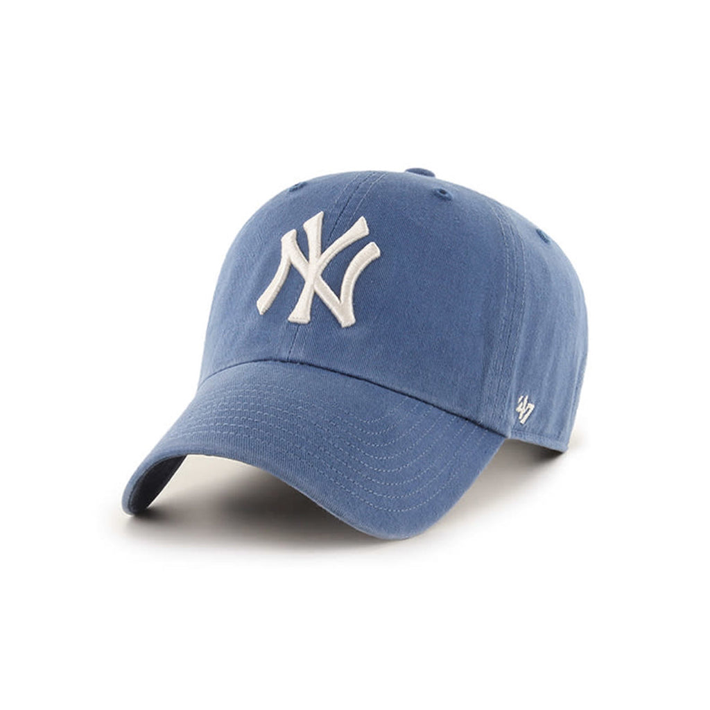Blue baseball cap with white logo on a white background