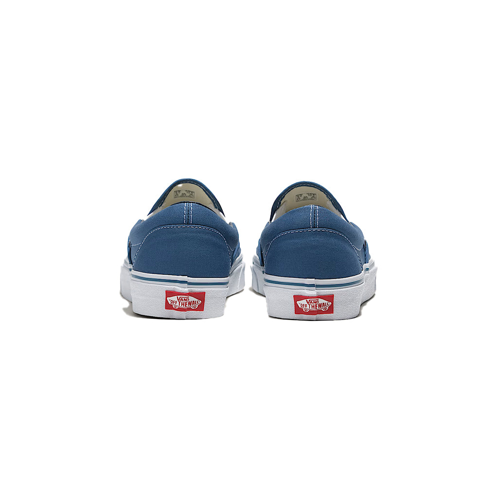 Blue Vans sneakers on a white background