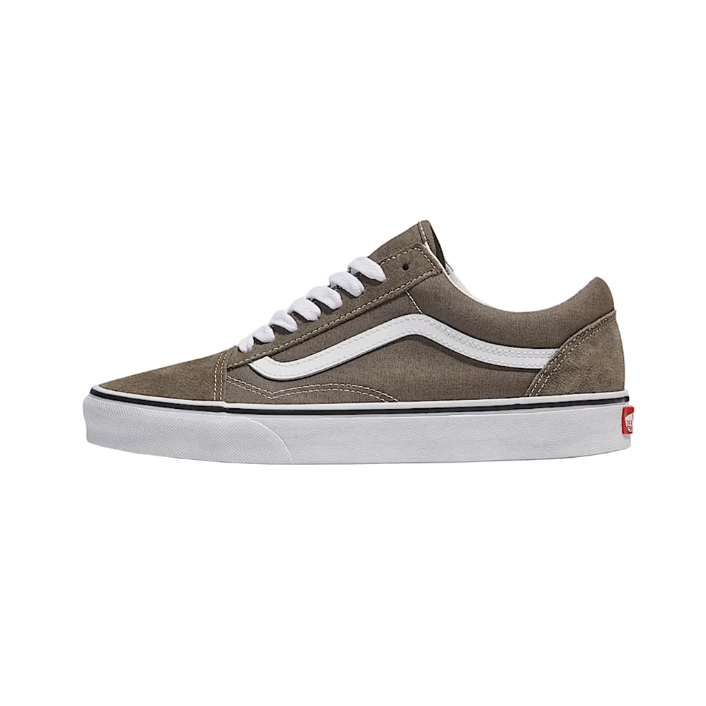 Side of brown Vans shoe on a white background