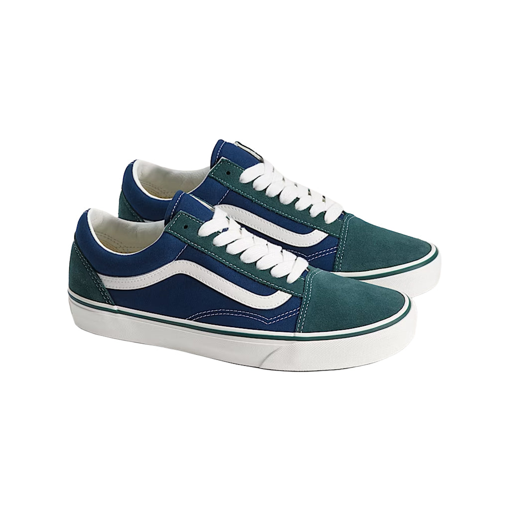 Blue and green sneakers with white accents on a white background