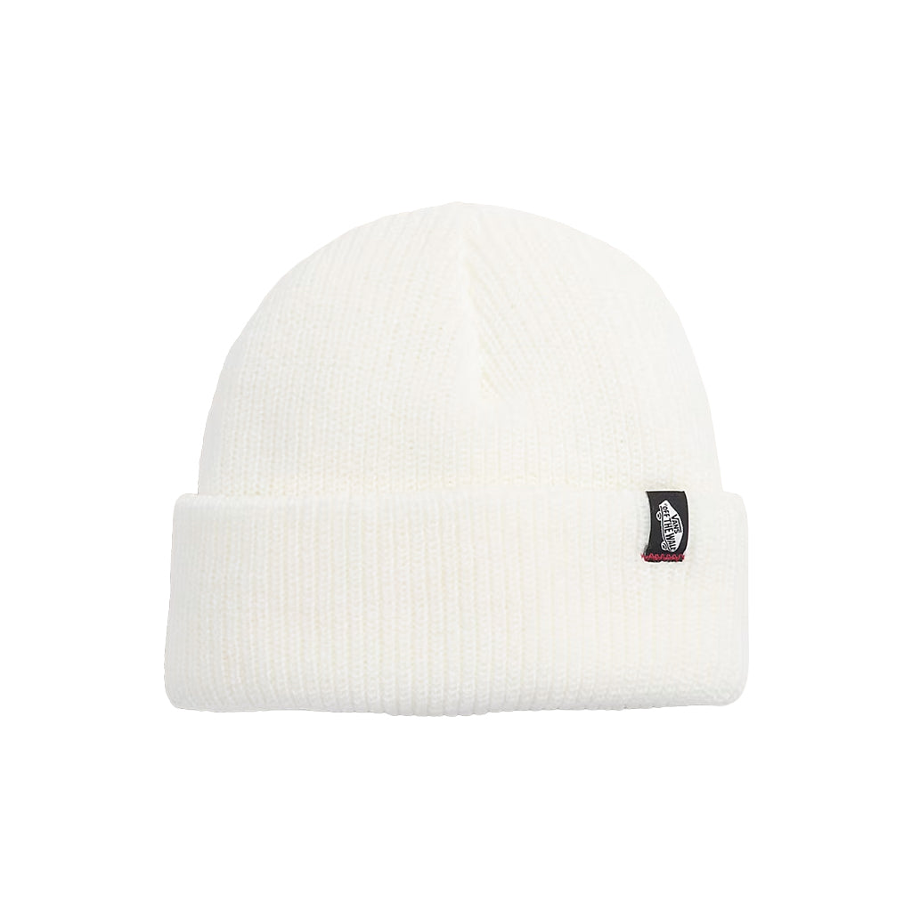White beanie with a small logo on a white background
