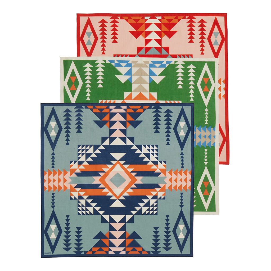 Three geometric patterned bandanas in red, green, and blue on a white background