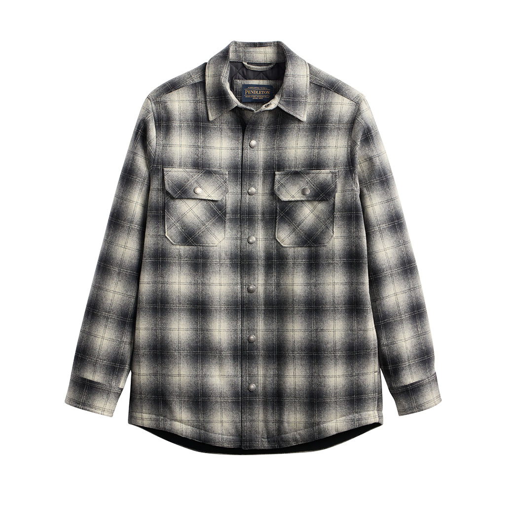 Plaid shirt with button details on a white background