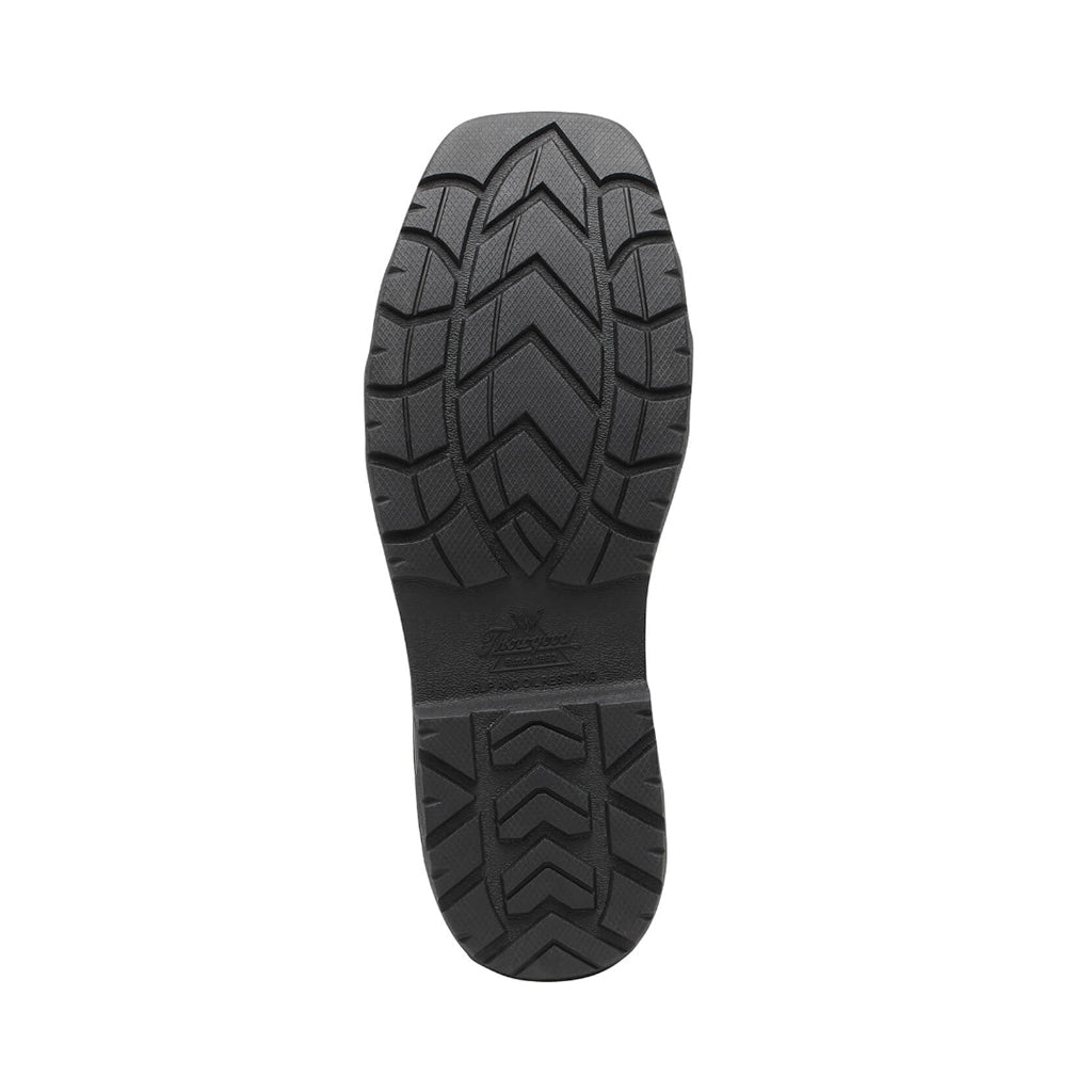 Black rubber sole of a shoe on a white background