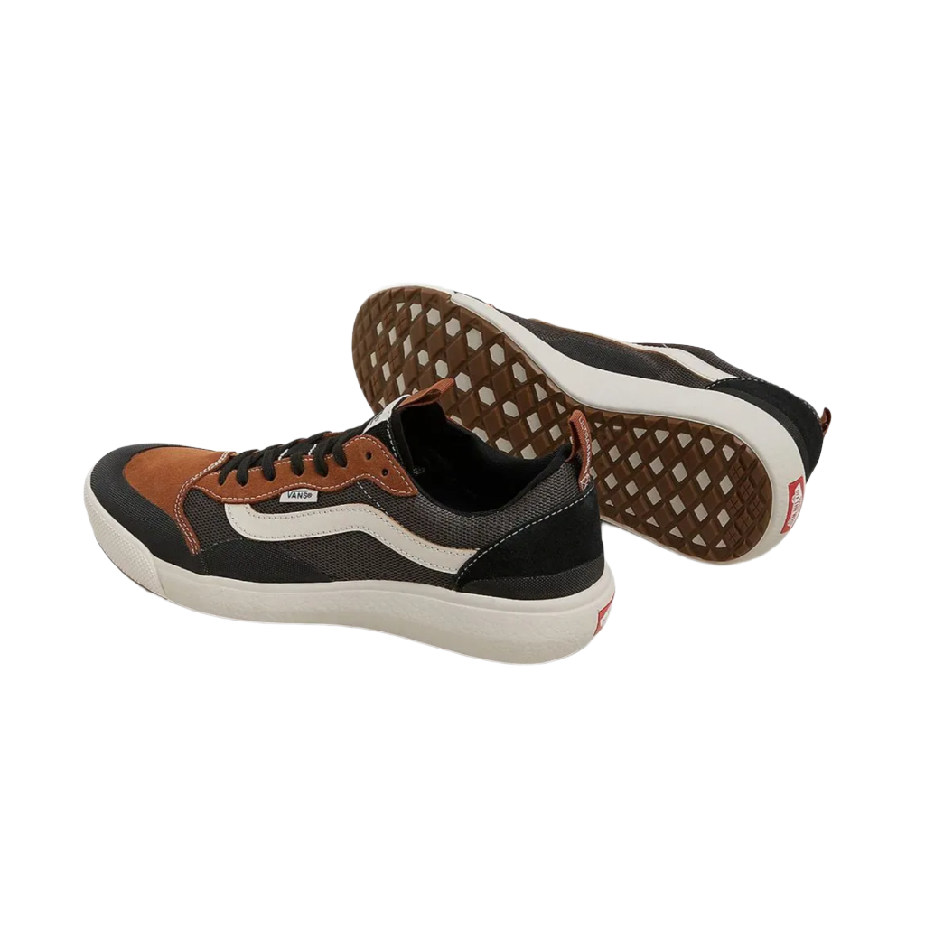 A brown and black Vans sneaker with a lace-up closure and a mesh upper.