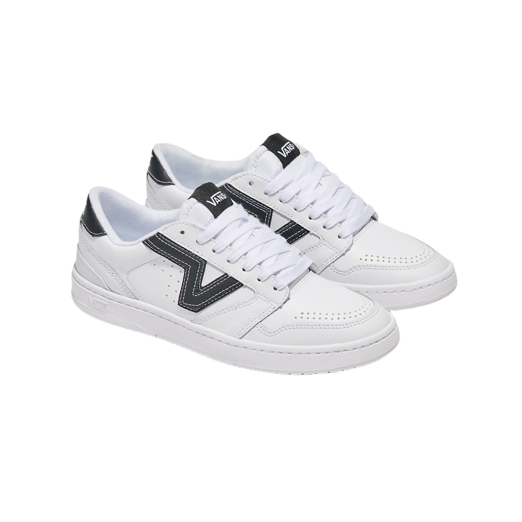 A pair of white and black Vans Lowland 2.0 sneakers with lace-up closure.
