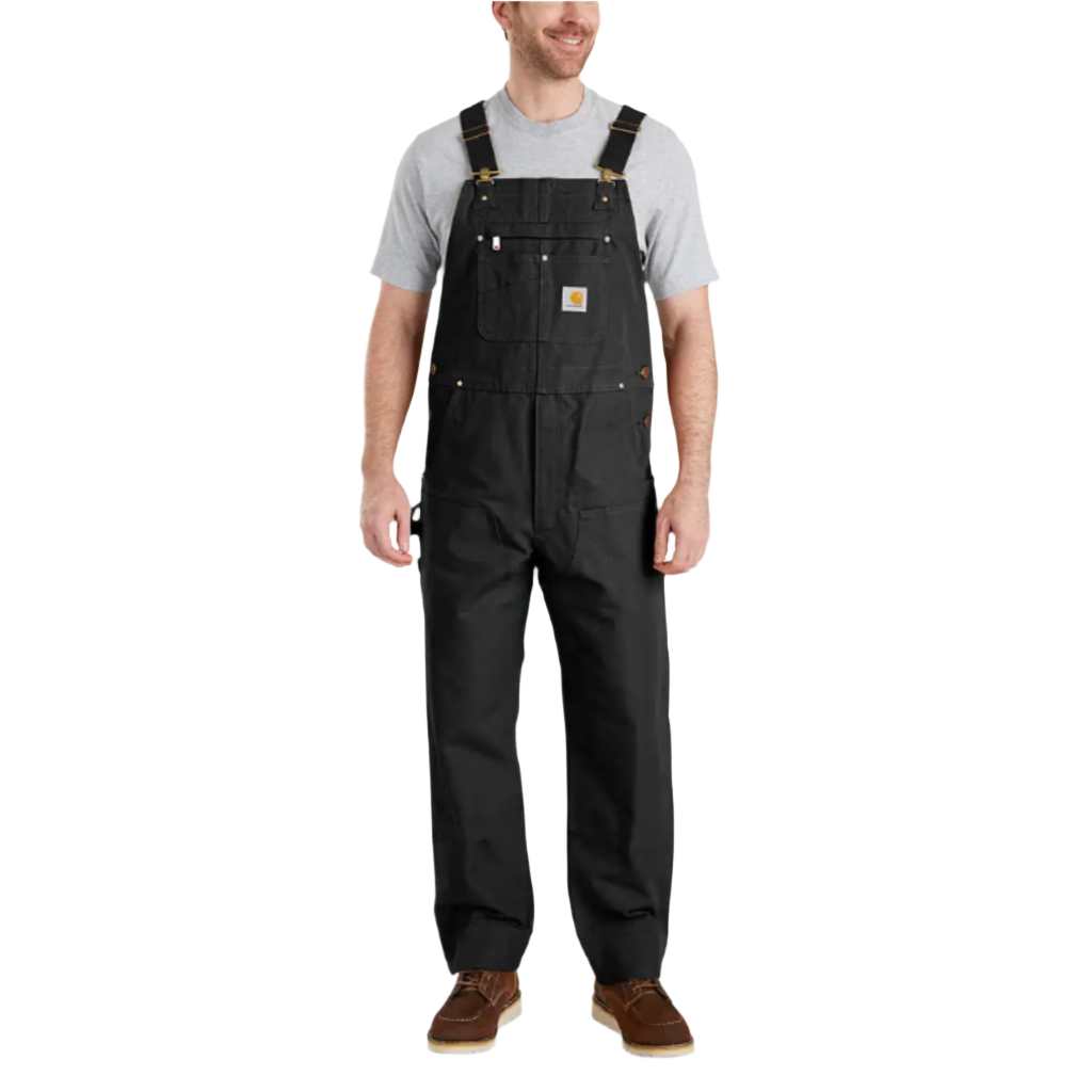 Person wearing black bib overalls on a white background