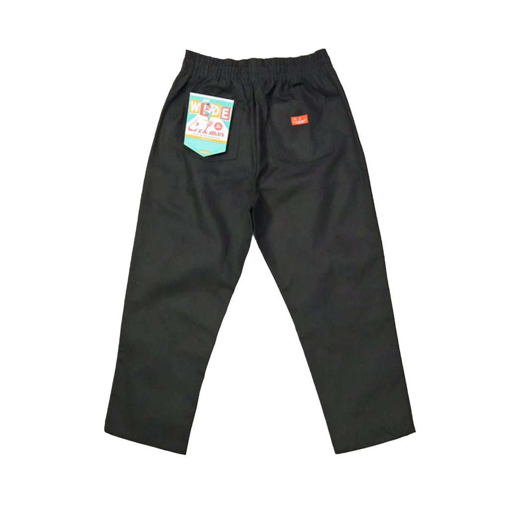 Black pants with colorful patches on a white background